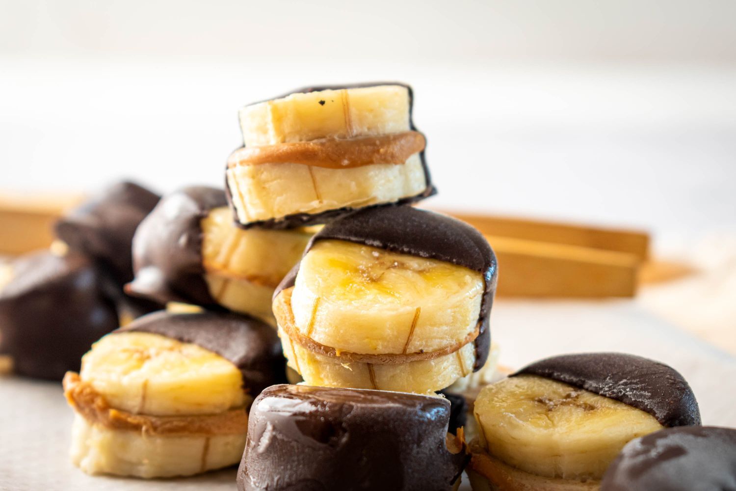 Frozen banana bites with chocolate and peanut butter.