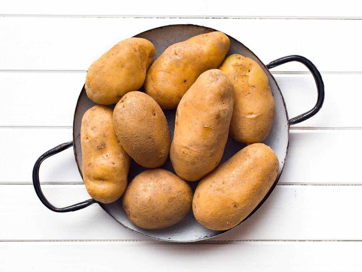 Brown potatoes in a pot