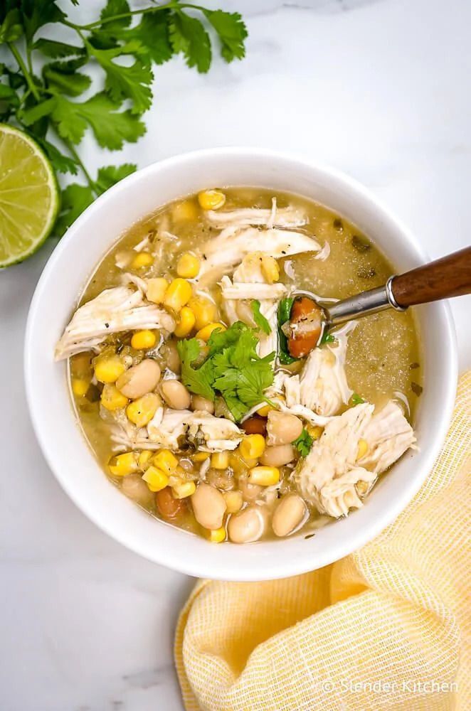 White Chicken Chili with beans, chicken, corn, cilantro and lime.