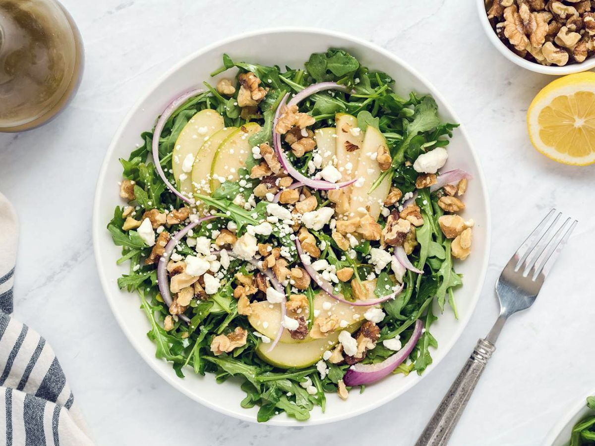 Healthy Salad Recipes Fresh Arugula Salad, Packed With goat cheese,Walnuts, Red Onions, and a Delicious Lemon Balsamic Vinaigrette
